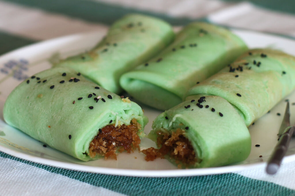 Pandan crepes with coconut and palm sugar filling