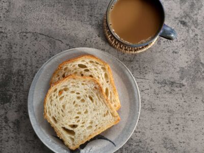 Home baked sourdough bread with a cup of coffee