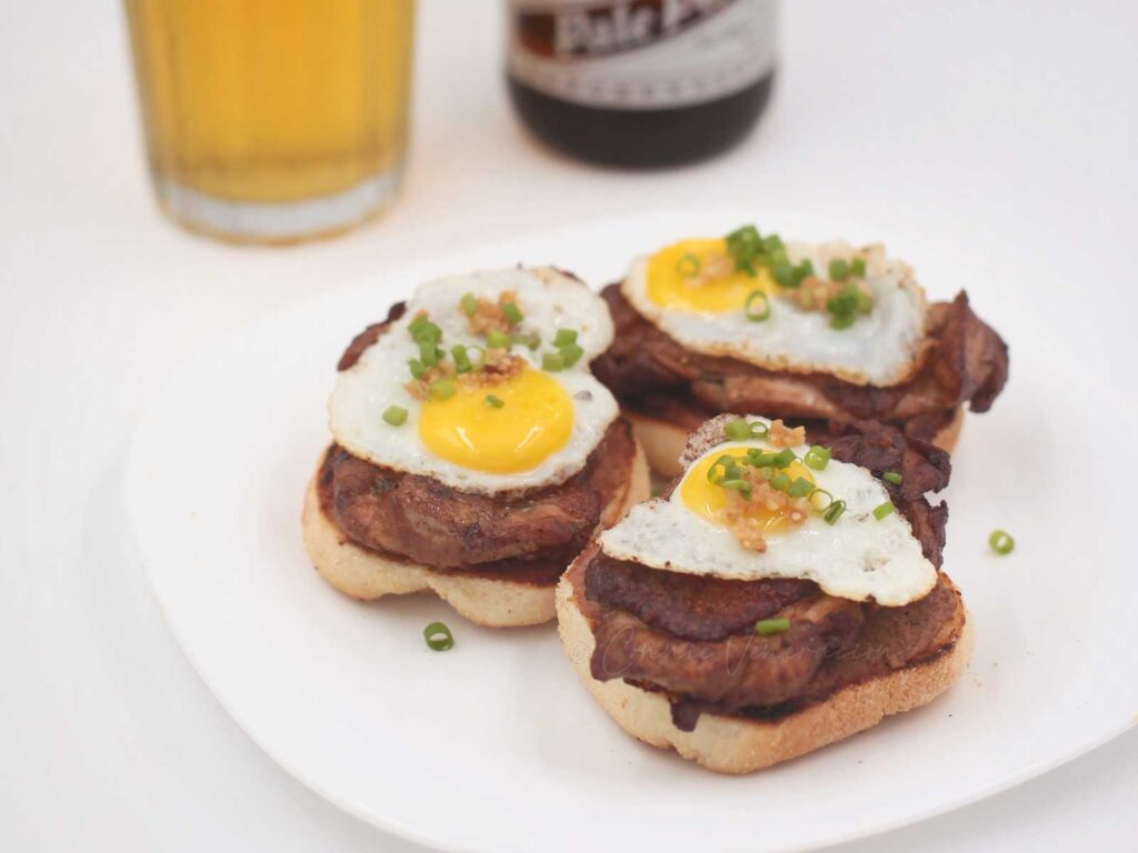 Filipino chicken adobo and quail eggs canapé
