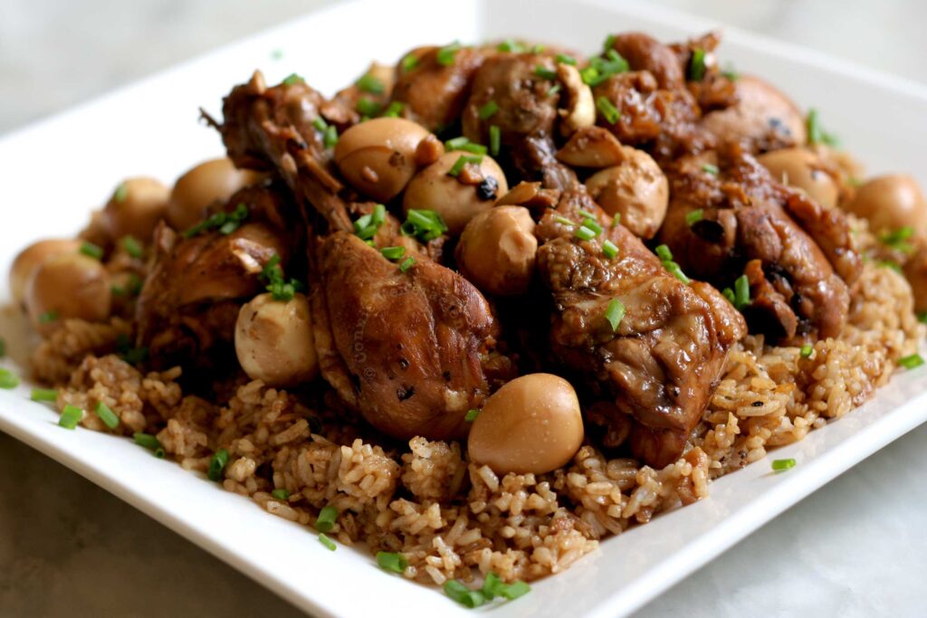 Chicken adobo, quail eggs and rice party plate