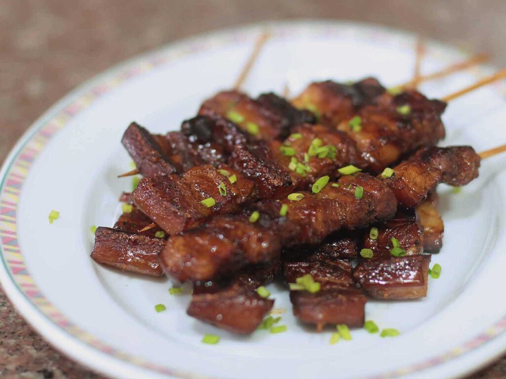 Skewered and grilled pork adobo
