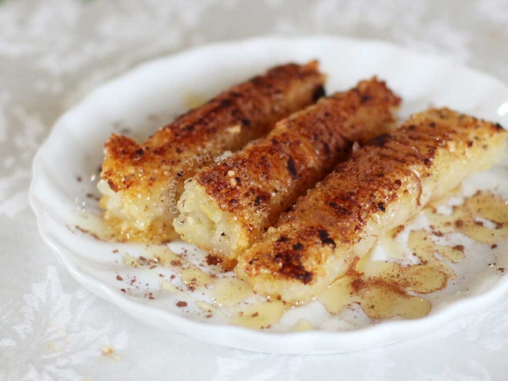 Fried suman (Filipino sticky rice cakes) with cocoa and honey