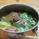 Boiled beef short ribs, bok choy and purple sweet potato soup