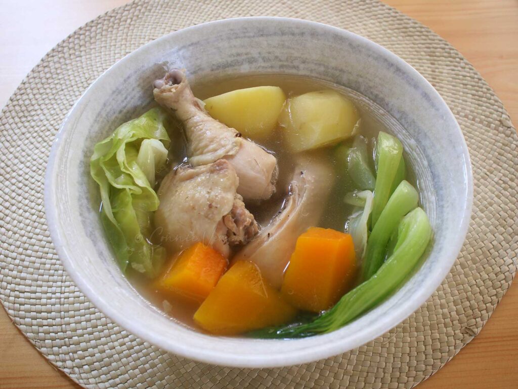 Boiled chicken and vegetable soup (Filipino nilagang manok)
