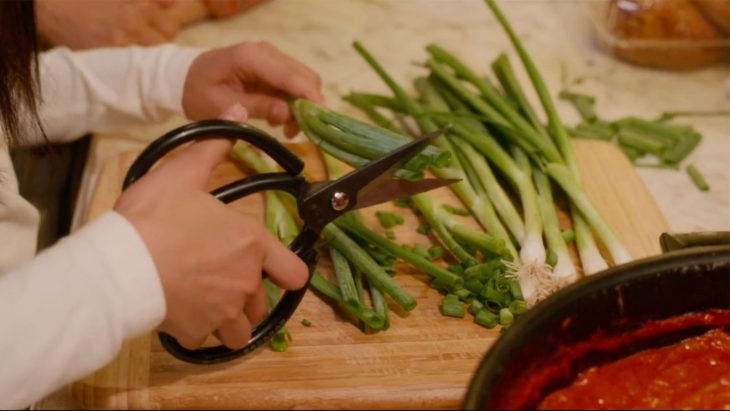 Cutting scallions with scissors (Scene from “Always Be My Maybe” | Image credit: Netflix)